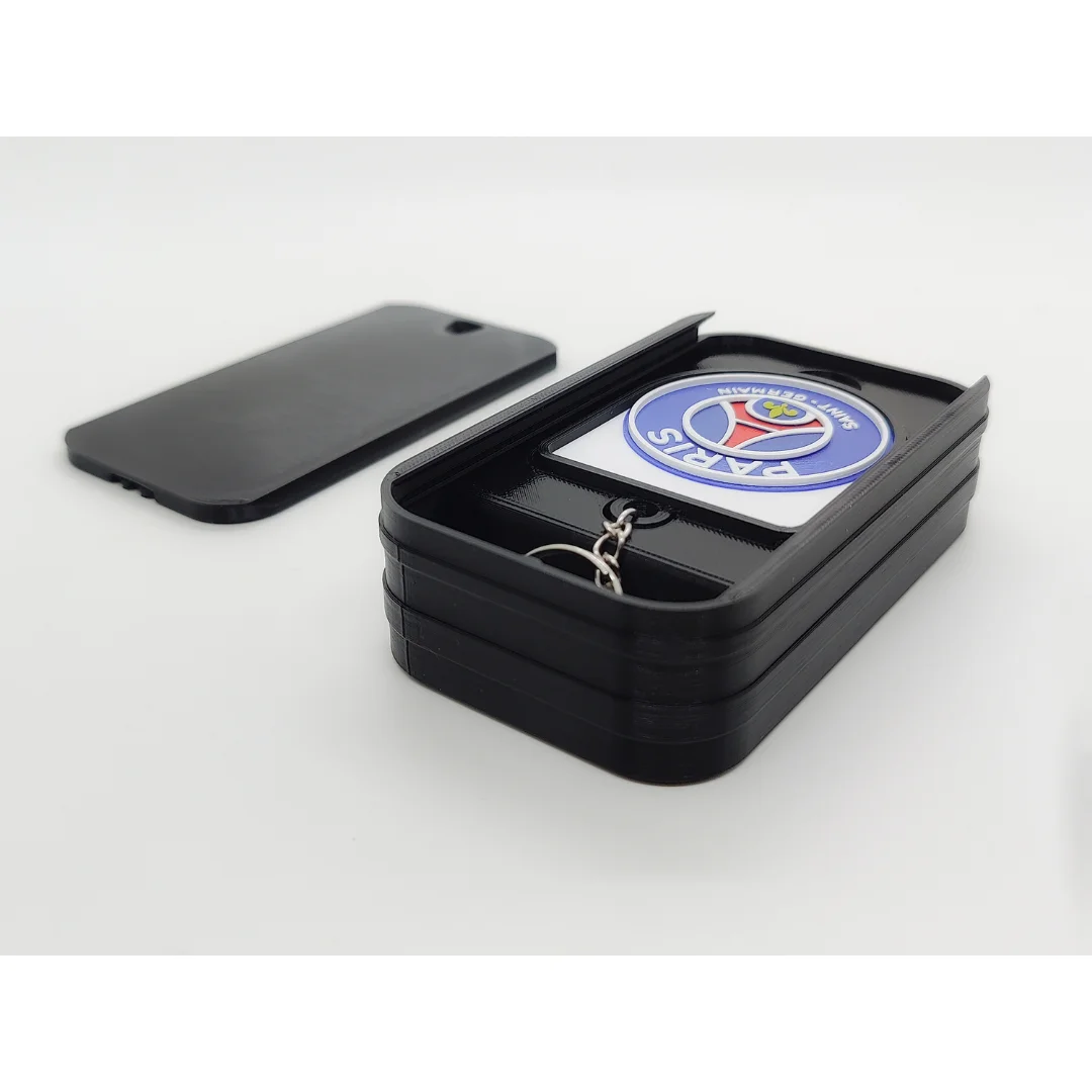 Paris Saint-Germain keychain displayed inside an open presentation box.
