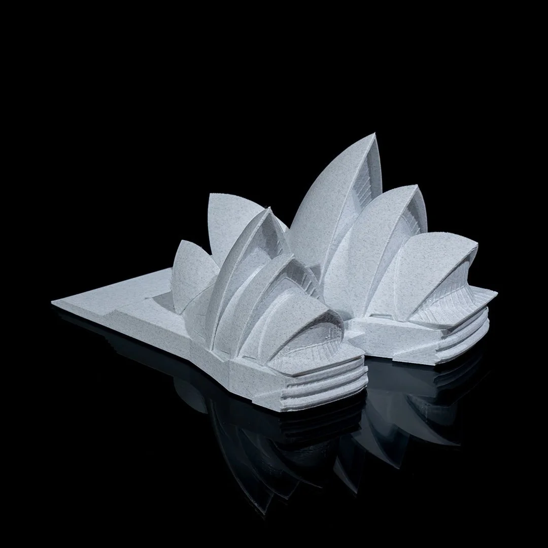 Opposite angled view of a Sydney Opera House model with tiered platforms.