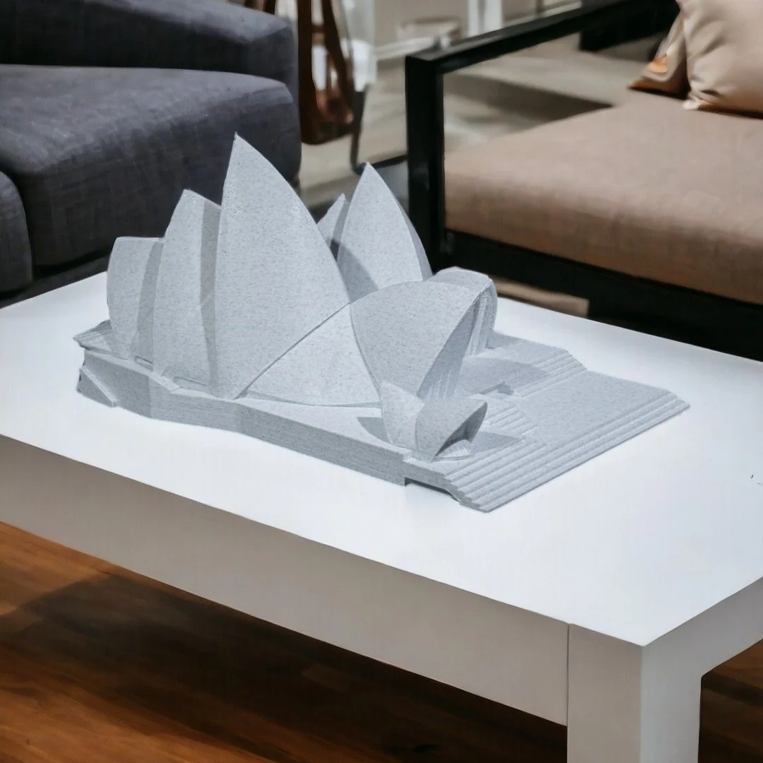 Sydney Opera House model displayed on a tabletop.