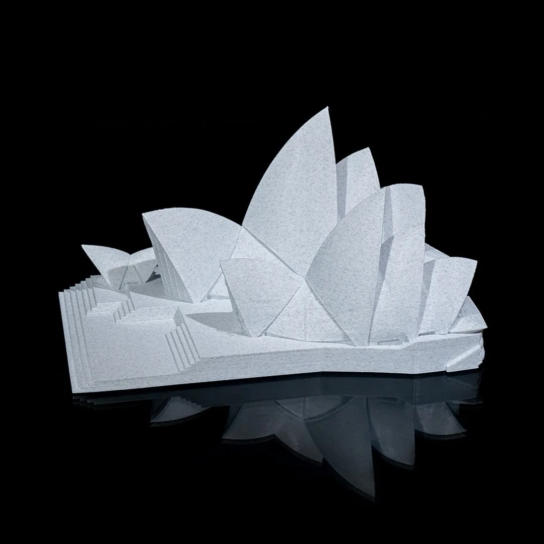 Side view of a Sydney Opera House model showing the overlapping roof shells.