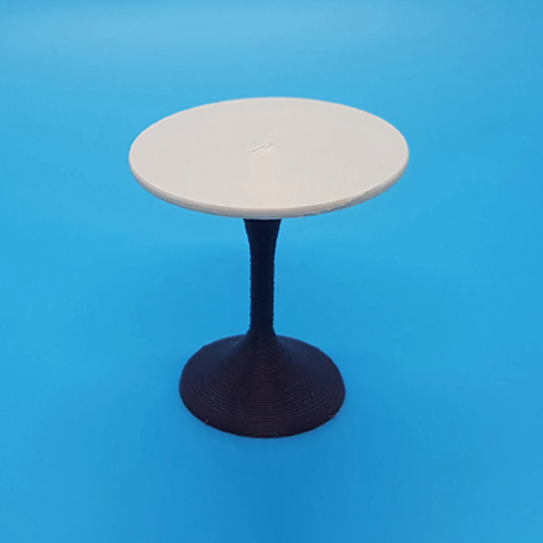 Rounded Dining Table miniature model at 1:20 scale.