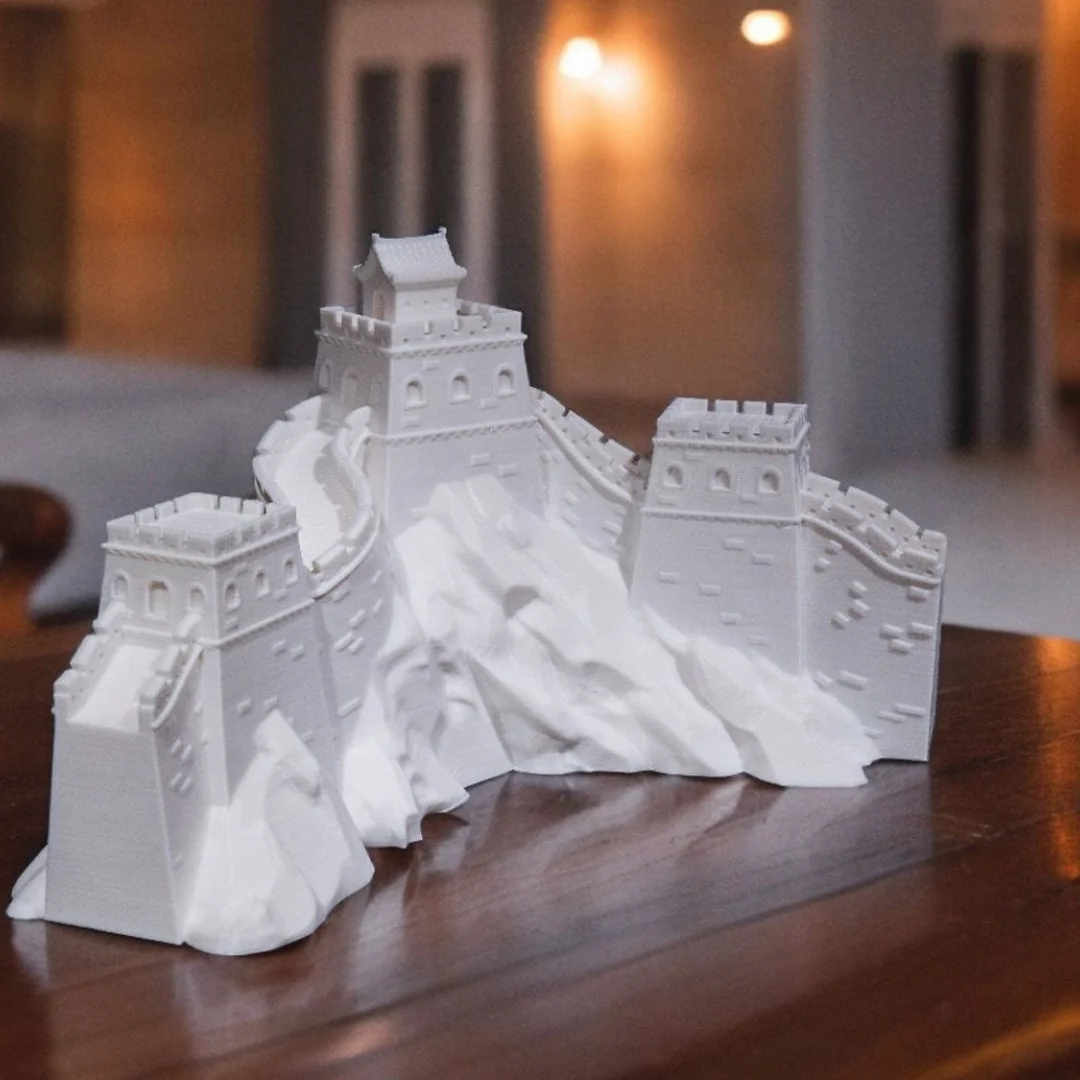 Angled tabletop view of a Great Wall of China model with watchtower details.