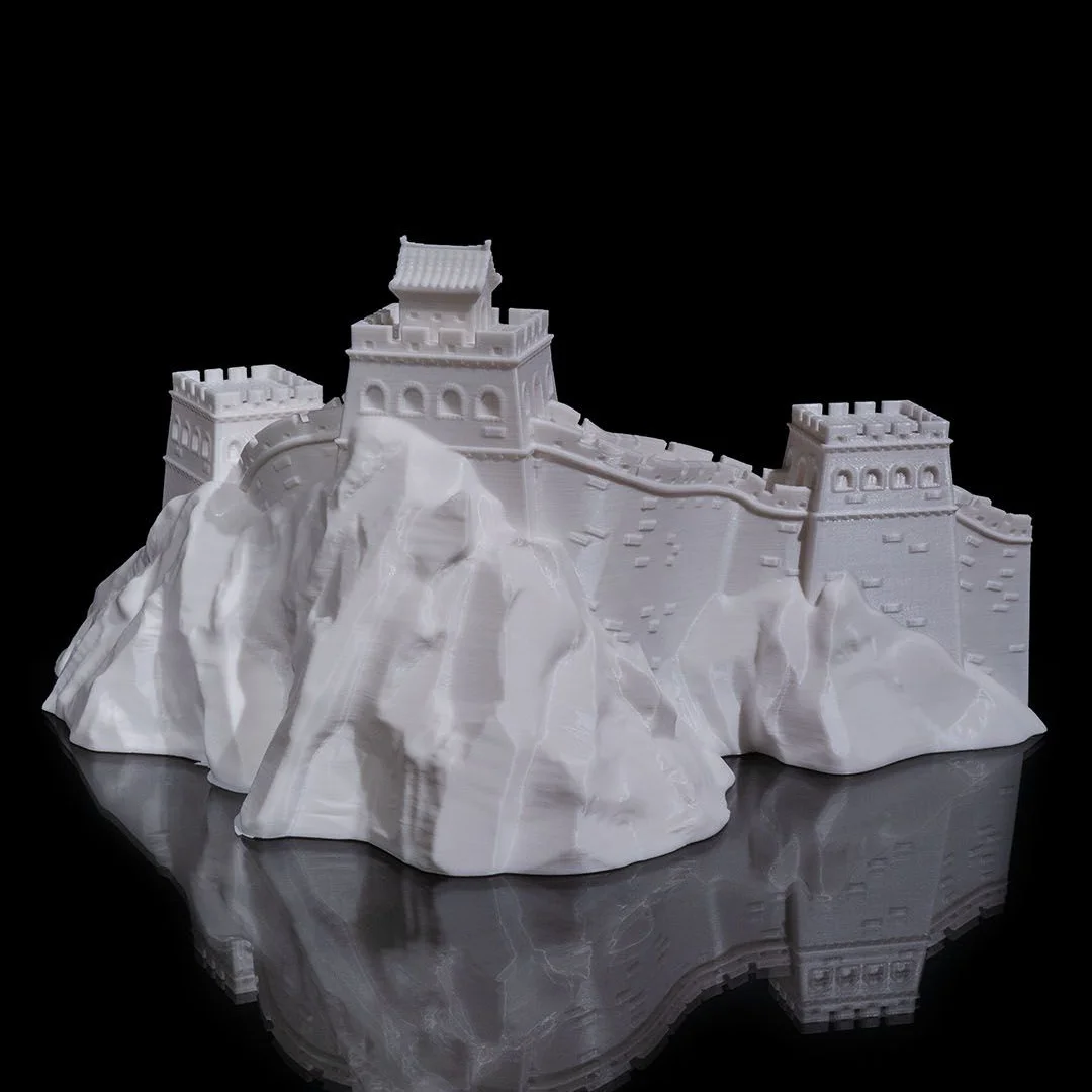 Opposite side view of a Great Wall of China model showing the mountain terrain.