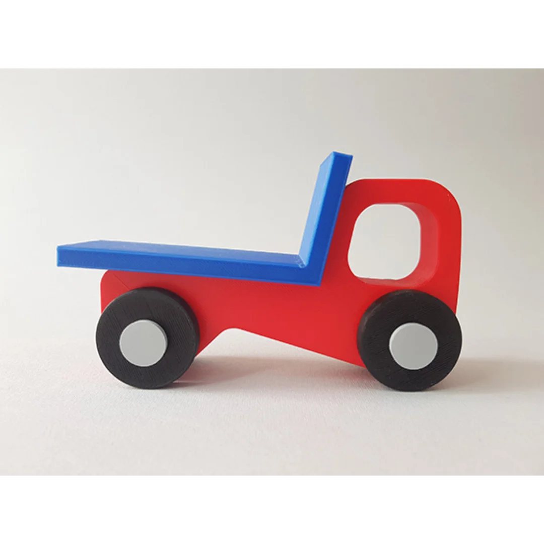 Side view of a 3D printed flatbed truck model with an open cab window.