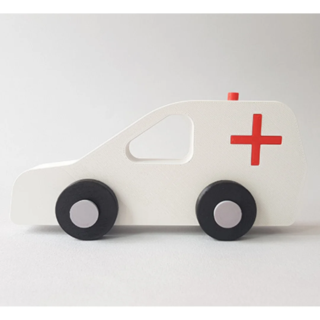 Side view of a 3D printed ambulance model with a cross symbol and roof light.