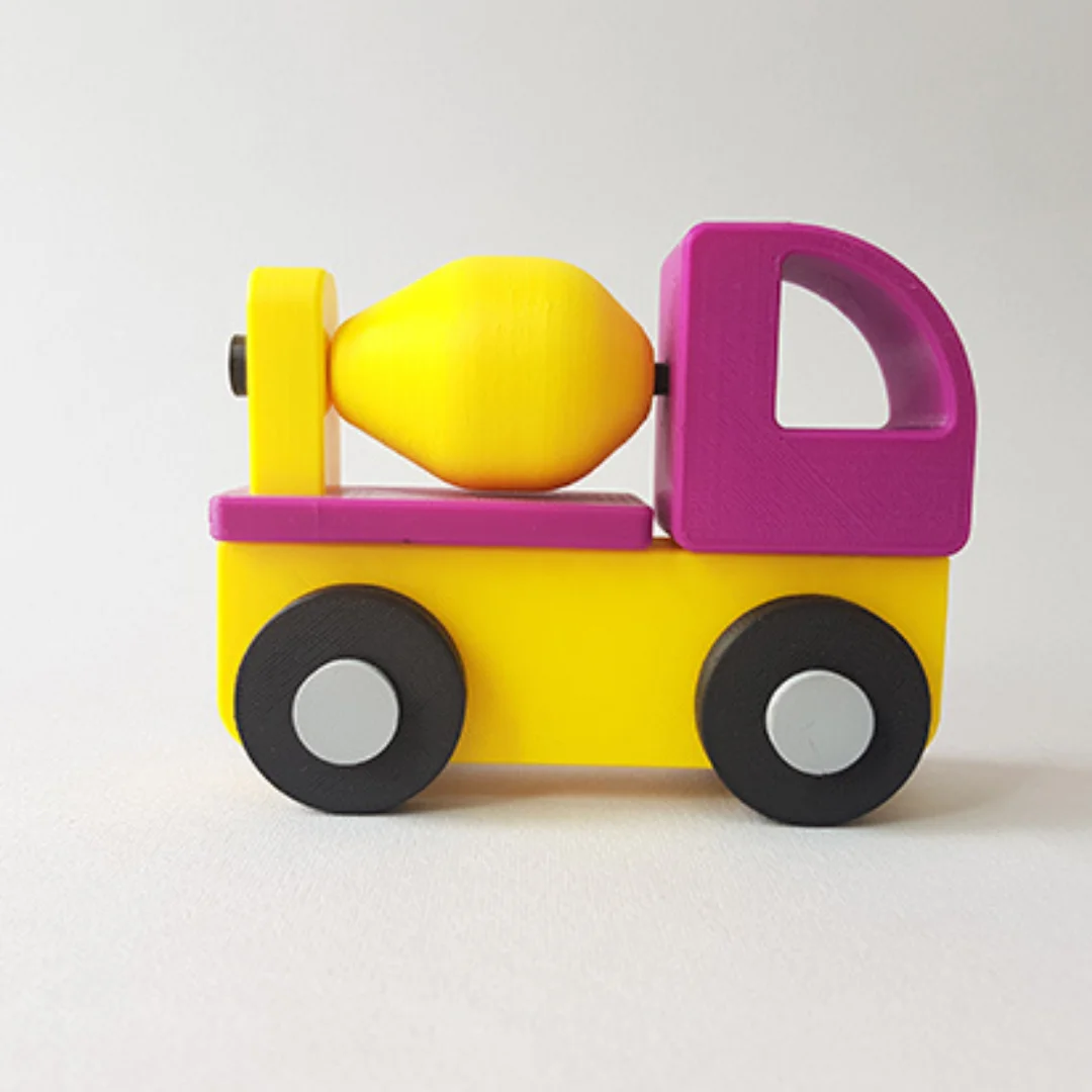 Side view of a concrete mixer truck model showing its mixing drum and cab.
