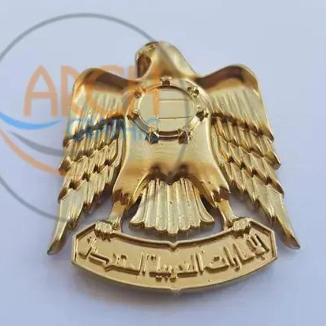 UAE falcon emblem model showing spread wings, a central shield and Arabic lettering.