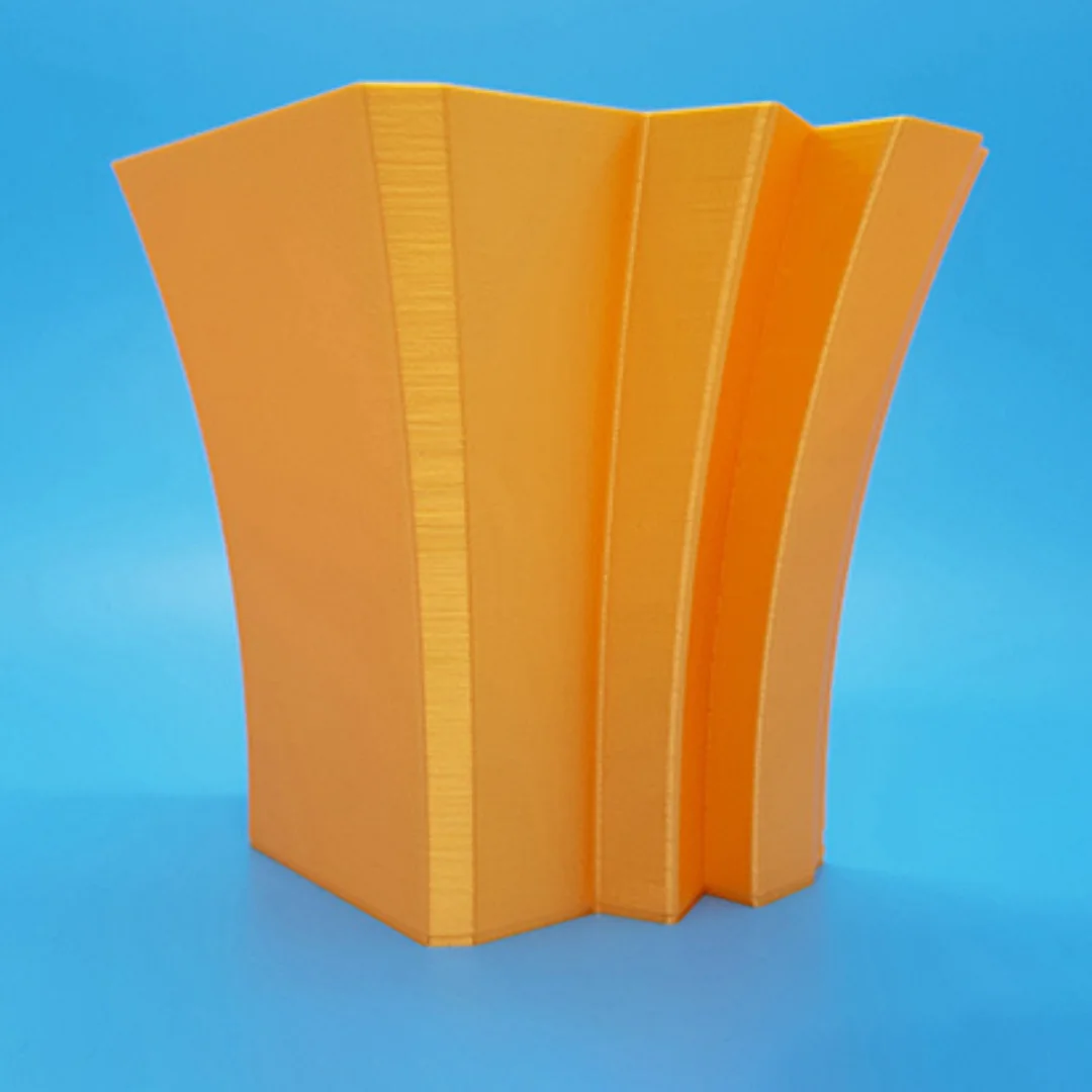 Side view of a UAE map vase showing its vertical ridges and tapered form.