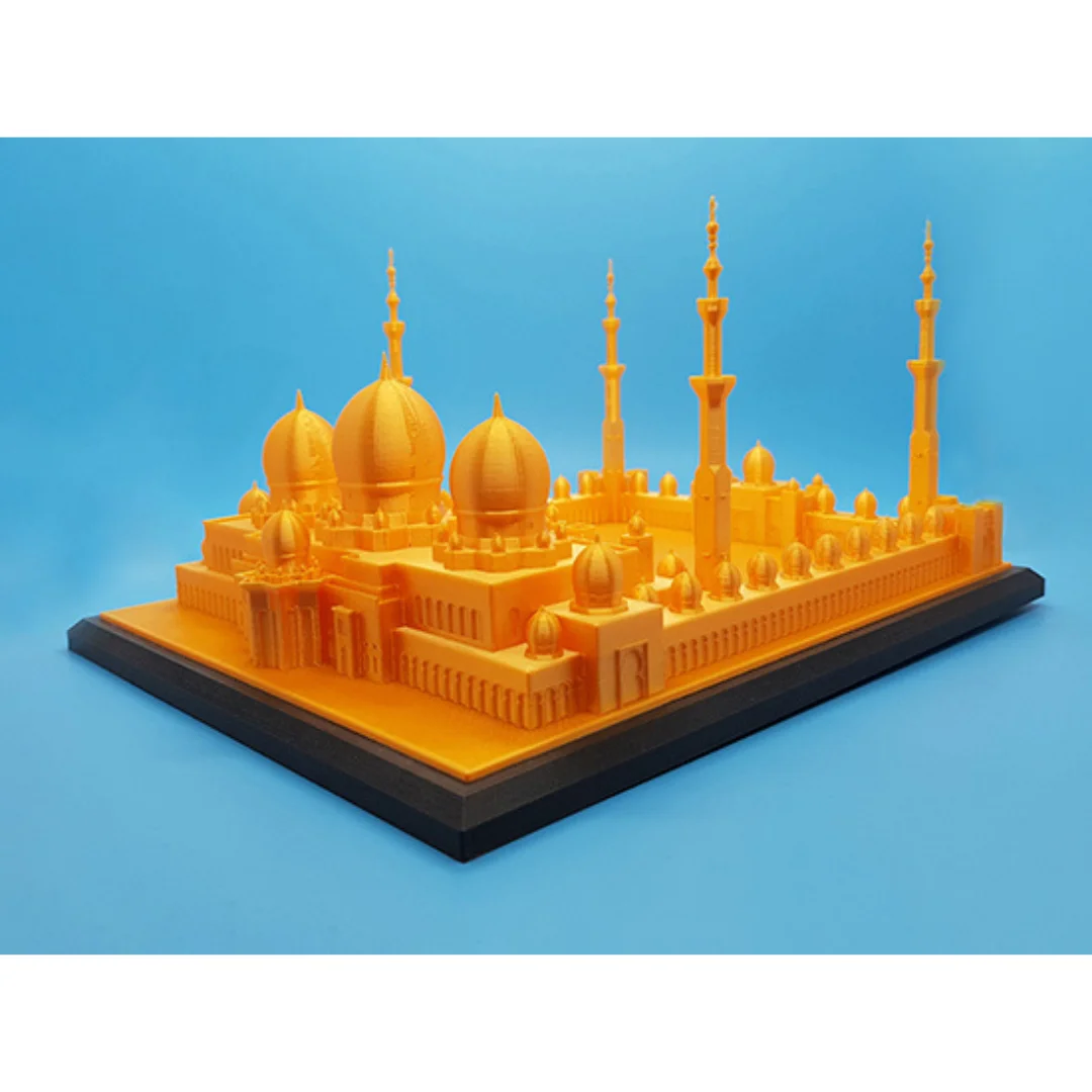 Angled view of a Sheikh Zayed Grand Mosque model showing domes and minarets on a display base.