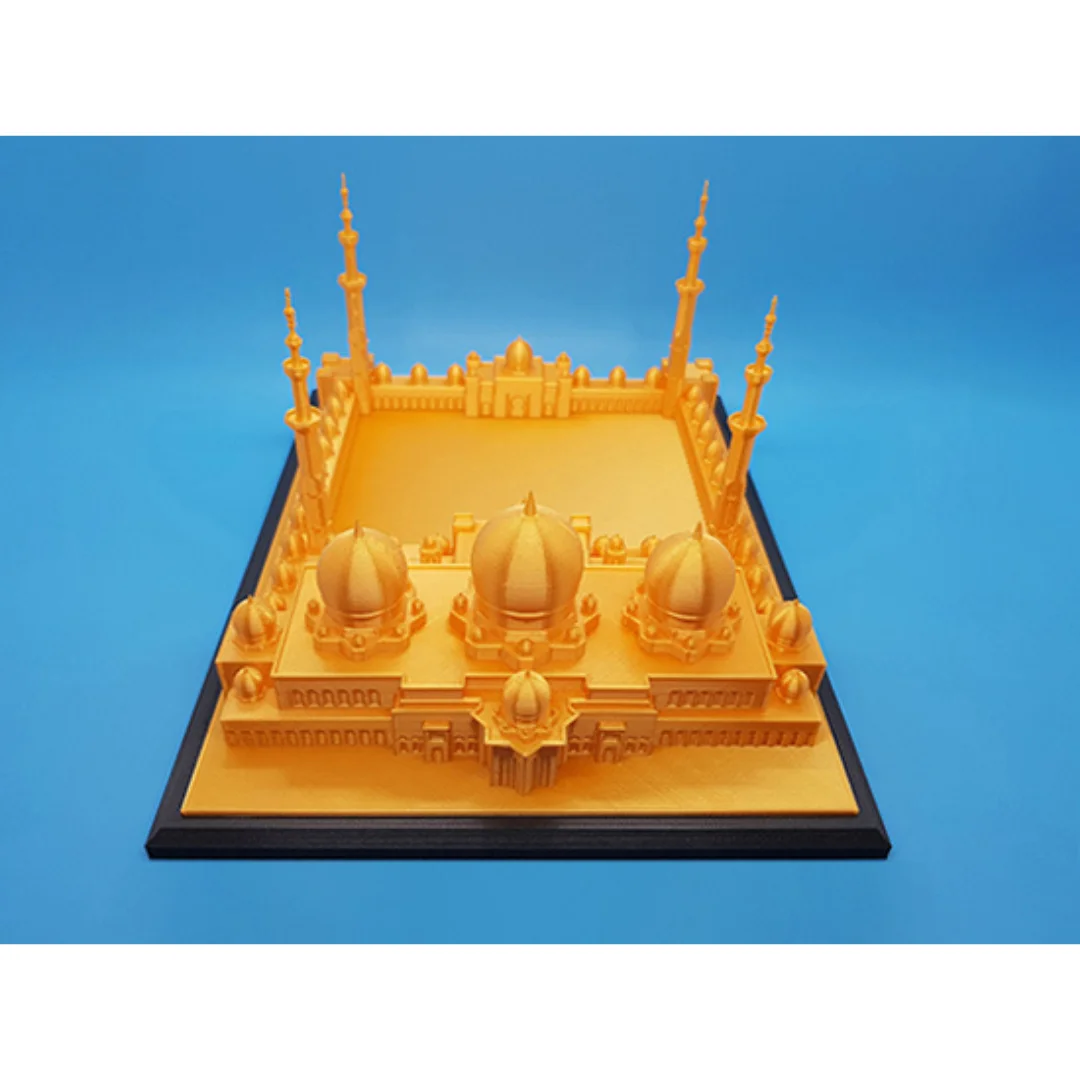 Overhead front view of a Sheikh Zayed Grand Mosque model and courtyard layout.