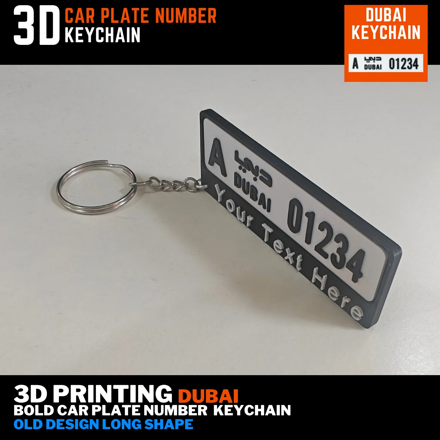 Dubai old long number plate keychain with a white plate, black custom name bar and silver keyring